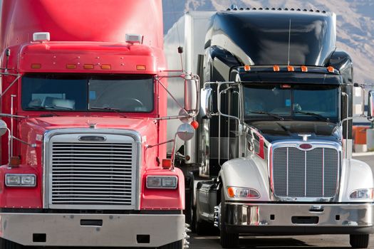 trucks in a row next to each other