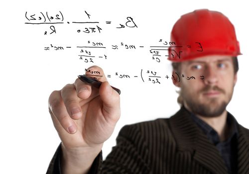 An image of constructor in a rad helmet writing with a pen