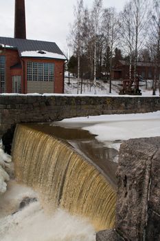 small waterfall at winter scene.