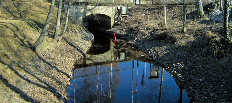 Small river and a tiny bridge