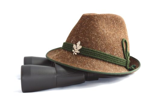 hunting equipment-old traditional wool hunting hat and binoculars