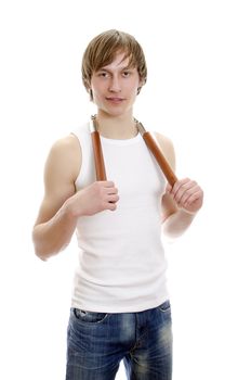 Martial Art. Man with nunchucks. Isolated over white.