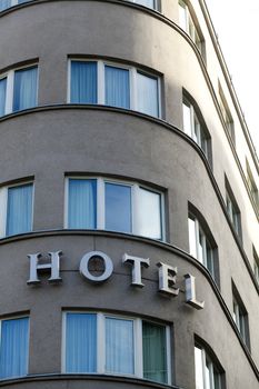 Inscription hotel on the front of the building