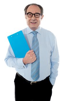 Corporate person holding document and smiling at camera
