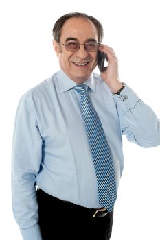 Businessman communicating on mobile against white background