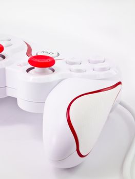 This is a half of white joystick on white background . It's have a shadow