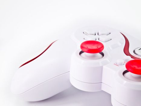 This is a half of white joystick on white background . It's have a shadow