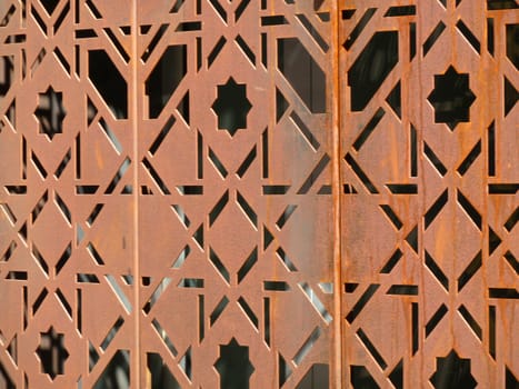 closeup of a section of rusty metal filigree