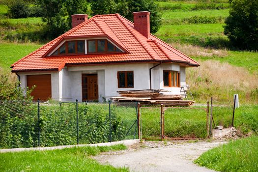 New house on green field