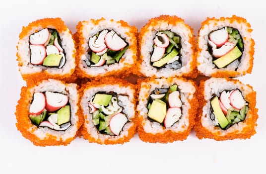 Sushi set with crab meat, avocado and red caviar on white background