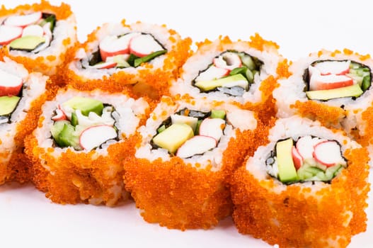 Sushi set with crab meat, avocado and red caviar on white background