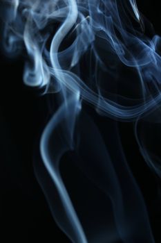 an abstract smoke picture in front of a black background