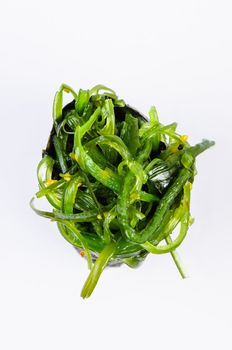 Gunkan with seaweed on white background