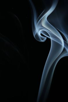 an abstract smoke picture in front of a black background