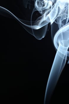 an abstract smoke picture in front of a black background