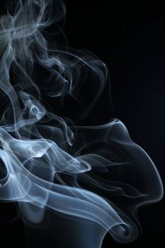 an abstract smoke picture in front of a black background