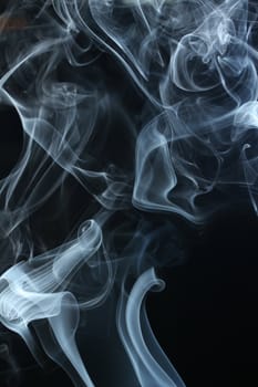 an abstract smoke picture in front of a black background