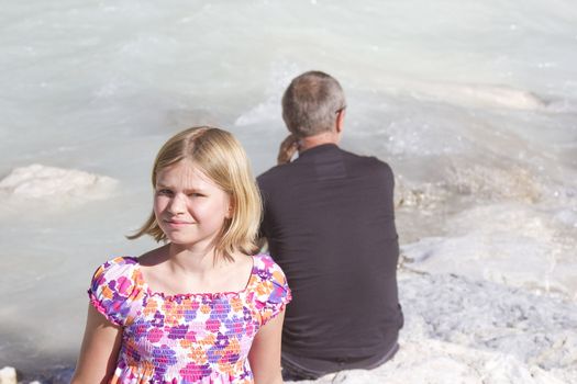 tourists resting on the river Soca in Slovenia