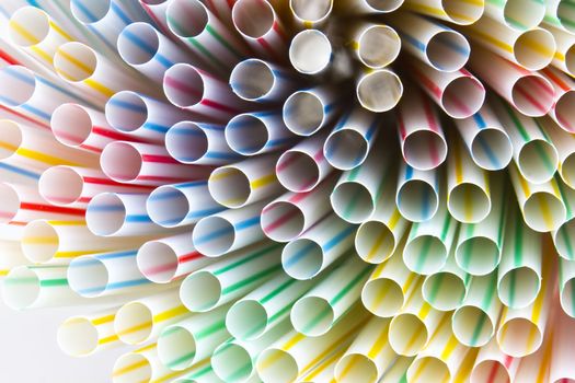 Colorful drinking straws background 