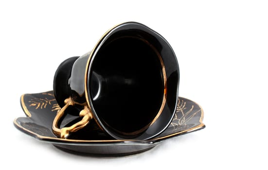 Black cup and saucer