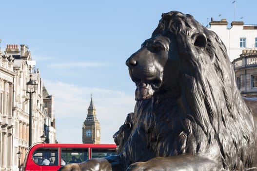Cropped shot of lion statue in Trafalgar square in central London, UK.