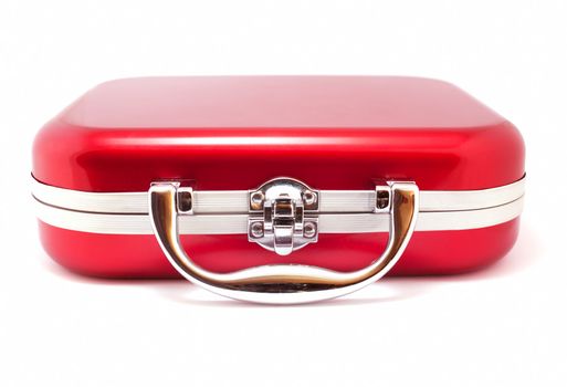 Red suitcase isolated over white