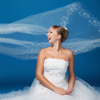 Bride photo isolated on blue background