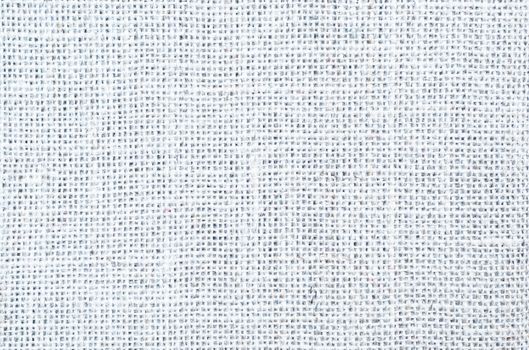 A woven hessian texture background in white.