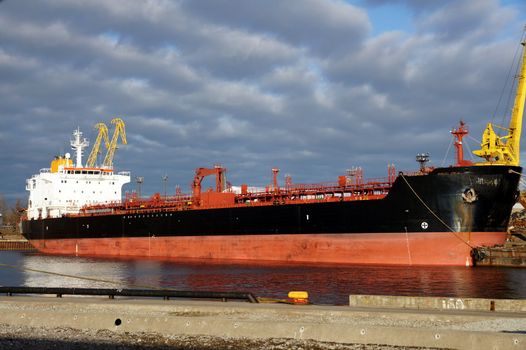 The tanker on a background of the sky and clouds