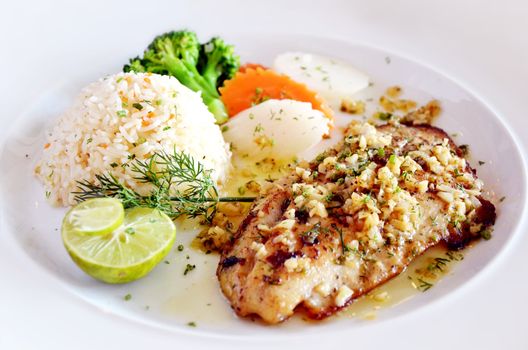 roasted fish served with fried rice