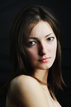 An image of a young beautiful woman close-up