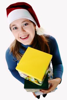A girl in a new year cap with a box
