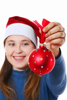 An image of a girl in a red hat with christmas ball