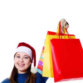 An image of a smiling girl in a cap with three packets