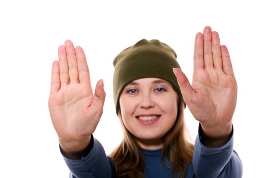 An image of a nice woman in a green hat showing her palms