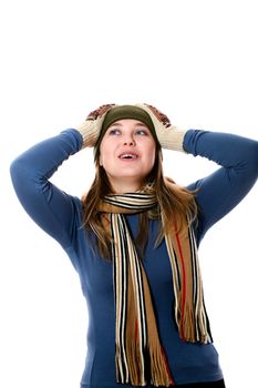 An image of a girl in a green hat and scarf