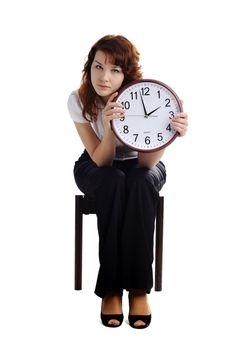 A portrait of a beautiful woman with a big clock