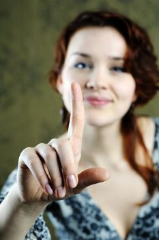 An image of young nice woman in studio