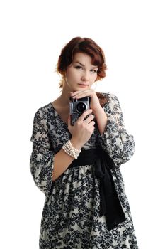 An image of a young woman with a camera