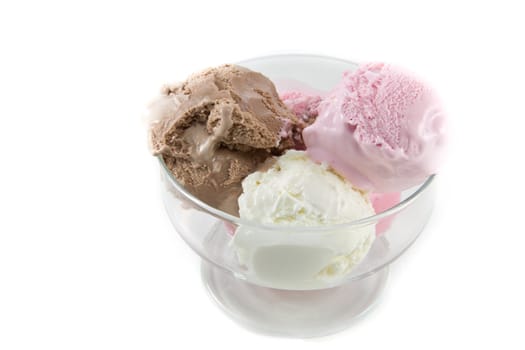 Picture of three different sort of icecream flavours in a bowl