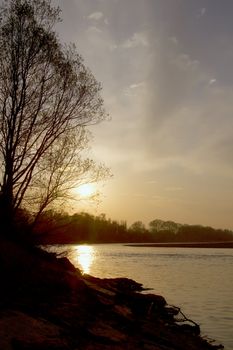 A Beatiful sunset over the side of a river