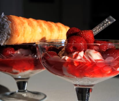 Portion of fresh strawberry dessert on the table close-up