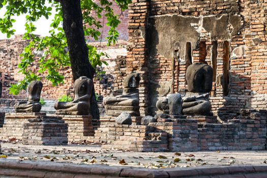 Ruin of Buddha statues in  historical park, at Wat Mahathat, Ayutthaya, Thailand