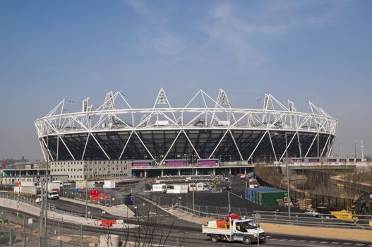 LONDON, UK – MARCH 24: London Olympics Stadium with its construction site on March 24, 2012 in London. The Olympic Park is due to be ready in summer for the games.