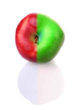 Fresh apple with stem and reflection, with red and green half