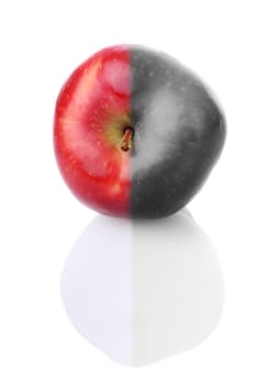 Fresh apple with stem and reflection, with red and colourless half