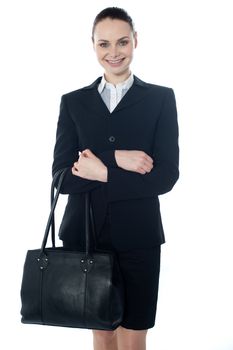 Corporate lady holding a handbag isolated over white