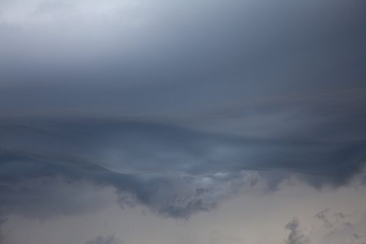 Dark grey cloudy sky during tropical storm