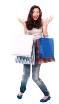 Emotional woman with shopping bags on white background