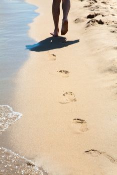 Footprints on the sand, selective focus 